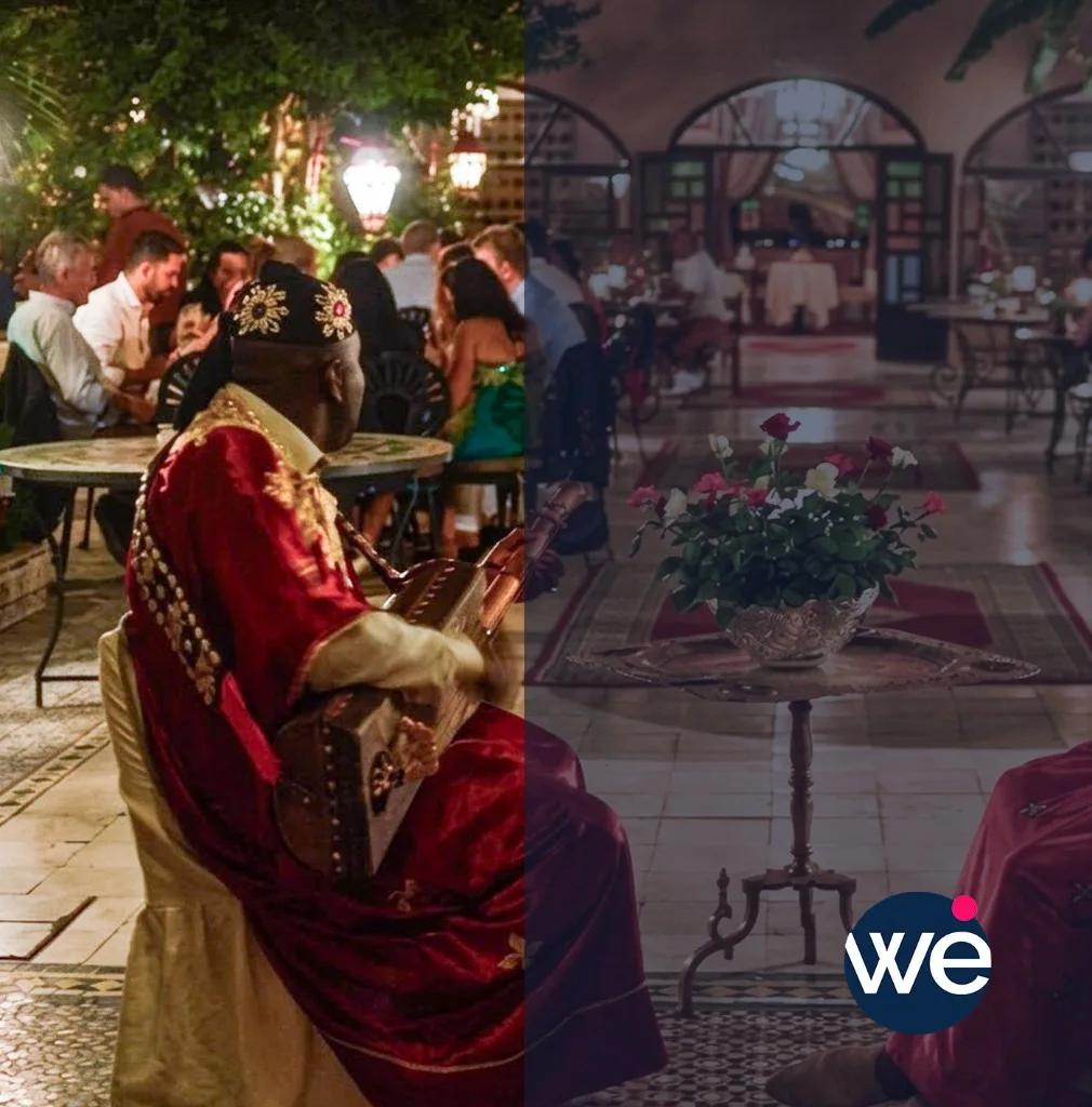 Musicien traditionnel jouant du guembri lors d'une soirée à thème orientale dans un riad au Maroc